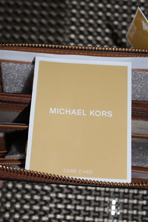 Michael Kors Money Pieces Pocket Zip Around Continental 